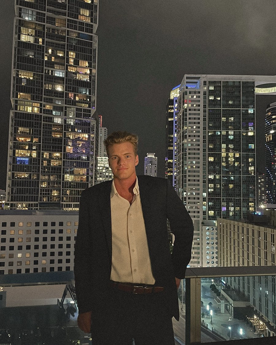 Spencer, founder of NeuroPouch, at his night desk